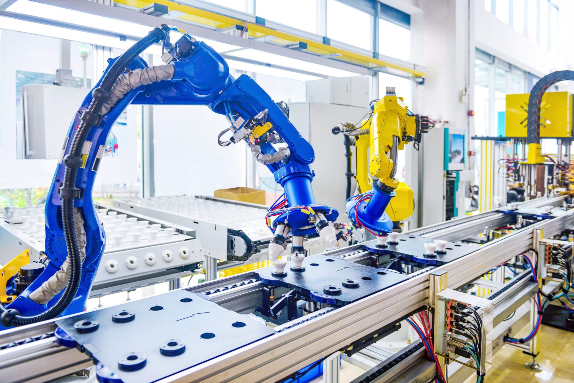 A robotic arm working on an assembly line